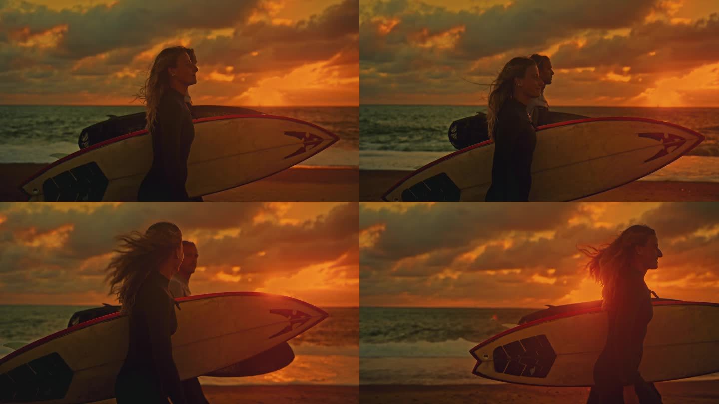 夕阳下的夏日沙滩上，一对冲浪夫妇扛着冲浪板
