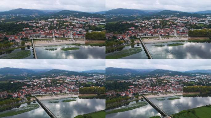 令人惊叹的空中4K无人机镜头，一个村庄——葡萄牙的利马桥和它的标志性建筑——横跨利马河的罗马石桥。拍