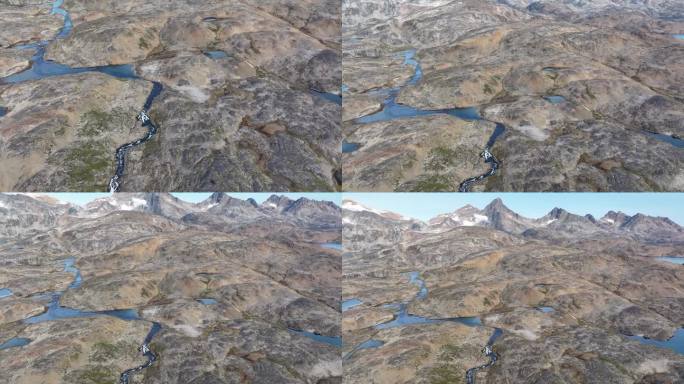 从空中俯瞰格陵兰岛山上的河流和湖泊
