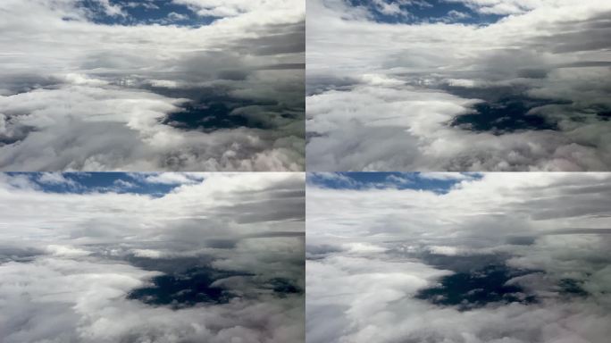 乘客从云层之间的飞机上看到的景象