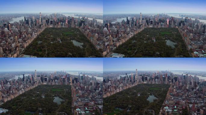 曼哈顿中城中央公园的美丽鸟瞰图。背景是自由塔和帝国大厦等标志性摩天大楼。纽约，美国。从直升机上拍摄