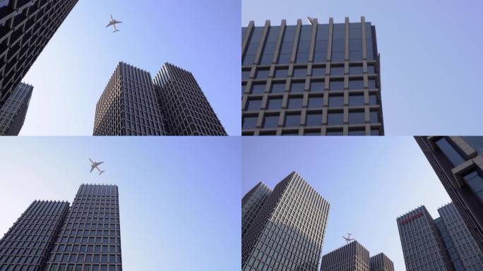 飞机飞过高楼商业区4k实拍