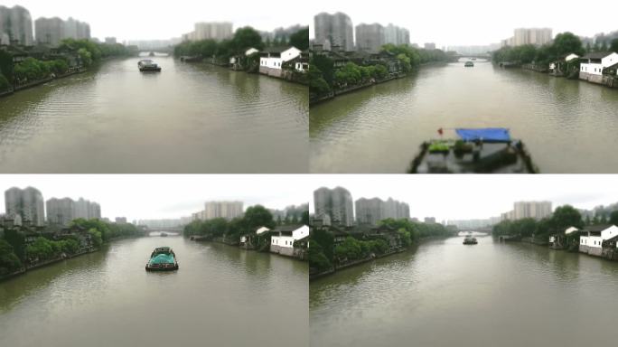杭州运河桥河段运输船延时摄影微缩商务货船