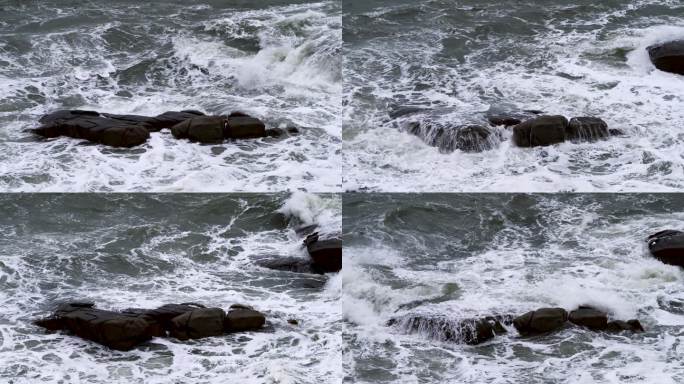 海边的海浪拍打着礁石