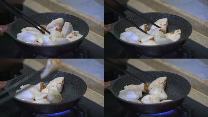 一位厨师在煎制酿肉柚子皮