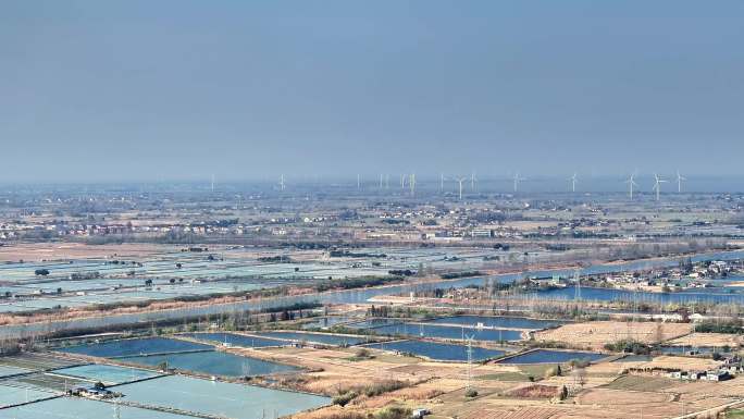 航拍扬州高邮湖风力发电鱼塘平原田野堤防