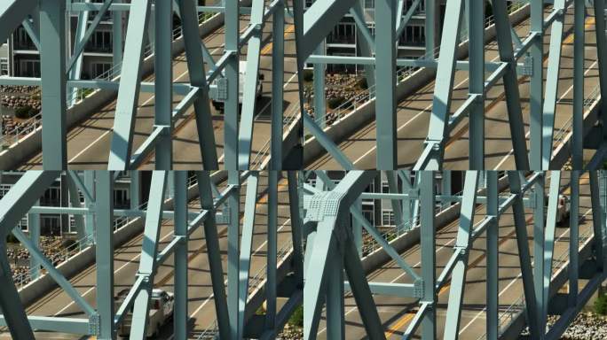 行驶在美国明尼苏达州沃巴沙-纳尔逊大桥上的汽车。-空中特写