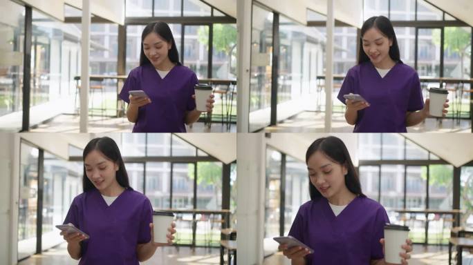 快乐的亚洲女护士，穿着紫色的手术服，拿着咖啡杯，从自助餐厅走回来