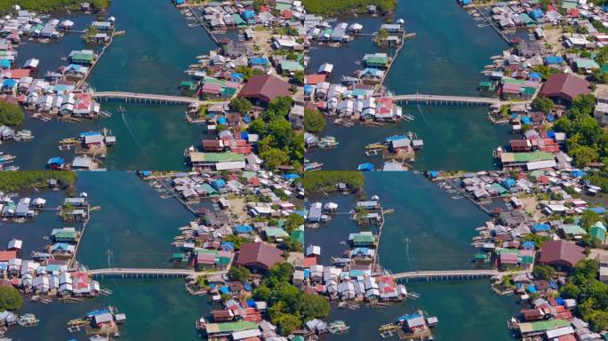 无人机拍摄的菲律宾北苏里高的Day Asan漂浮村的画面。阳光明媚的一天。