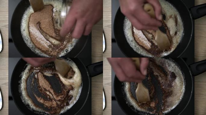 一个家庭厨师混合原料自制焦糖。在煎锅里煎肉桂、糖和黄油。
