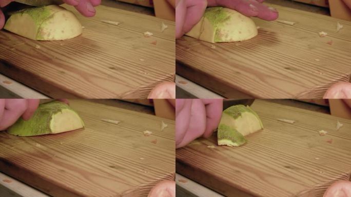 低角度宏观视角:刀切木板上的芜菁蔬菜