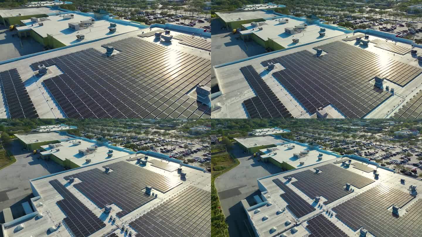 商场楼顶蓝色光伏太阳能板鸟瞰图，可产生绿色生态电力。生产可持续能源的理念