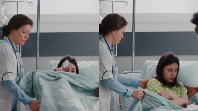 垂直视频:医疗团队在紧急情况下帮助生病的妇女上床