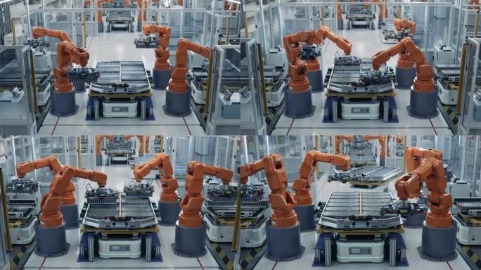 橙色机械臂装配线上汽车工业用电动汽车电池组的延时拍摄。自动化电动汽车智能工厂。配备机械臂的电池生产线