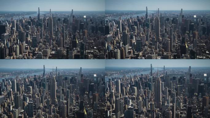 纽约市白天的天际线。直升机航拍画面。帝国大厦与其他著名的城市地标和摩天大楼。现代混凝土丛林建筑