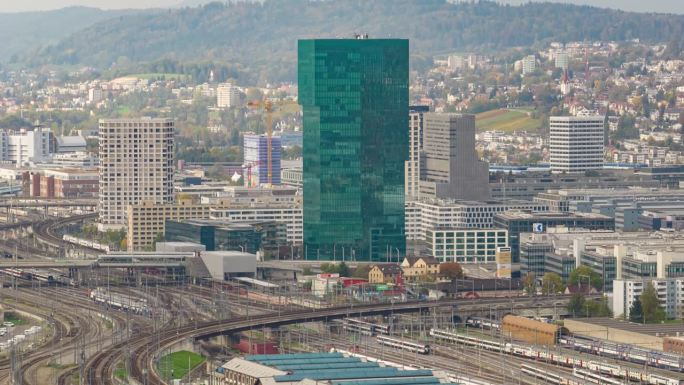 白天苏黎世市现代办公大楼火车站铁路公路航拍全景延时4k瑞士