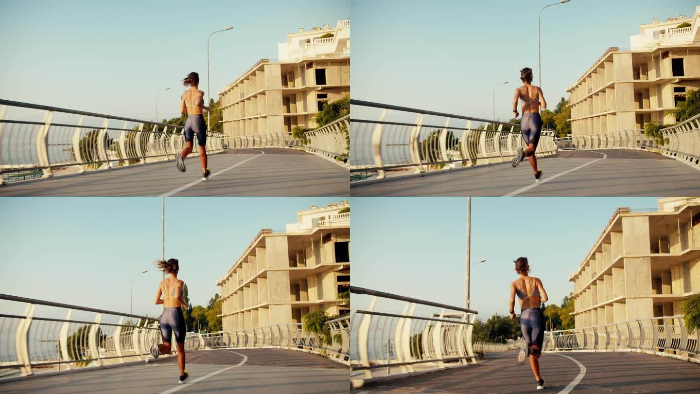 一个穿着夏季运动服的女孩沿着马路跑着，在拐角处拐了个弯。晨跑是健康生活方式的关键