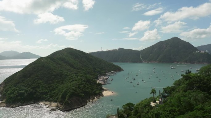 香港中岛及浅水湾，晴天停泊船只，海洋公园背景，热带假日，电影航拍镜头