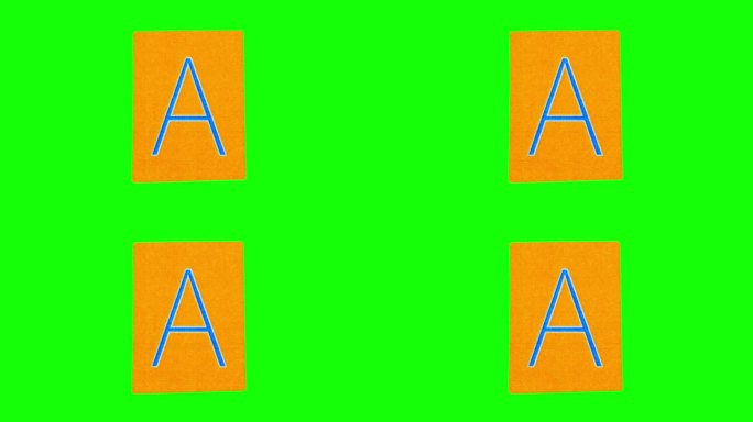 大写字母A，写在橙色的纸上，打开包装，然后在绿色的屏幕上揉皱