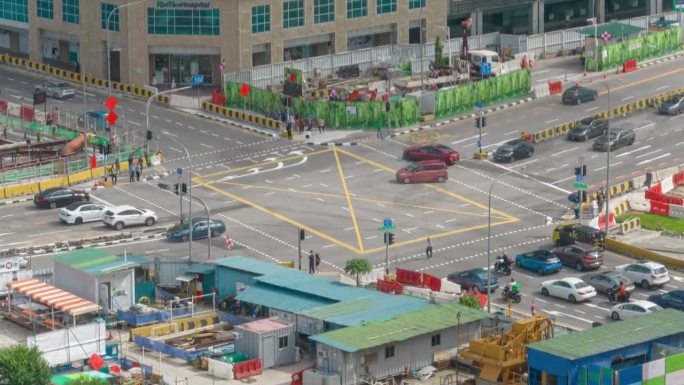 晴天新加坡市中心交通街道十字路口建筑航拍全景4k延时拍摄