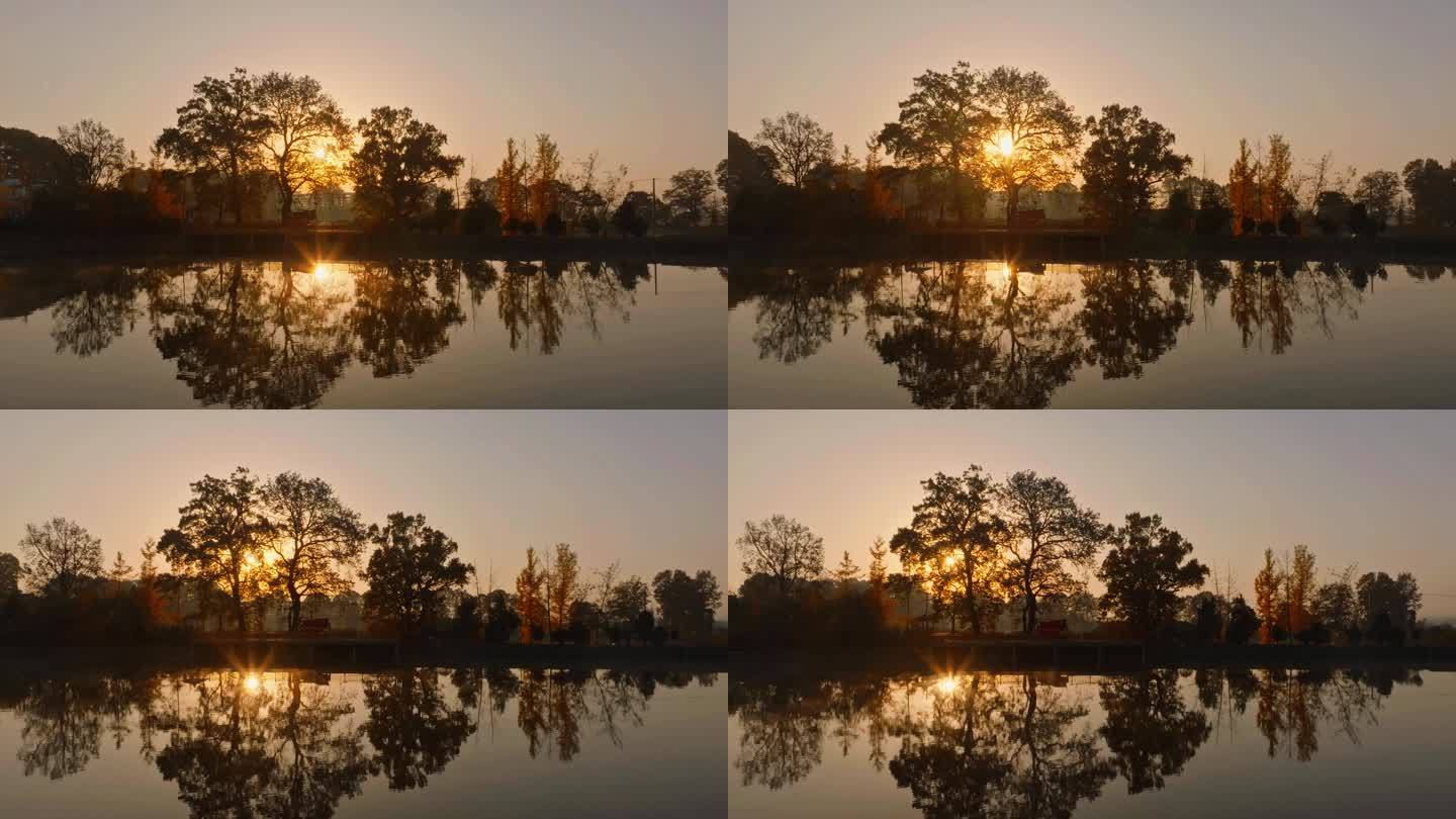 秋色下的晨曦 阳光洒在平静的湖面
