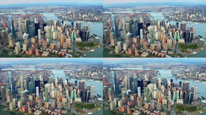 曼哈顿下城和中城摩天大楼鸟瞰图。背景是布鲁克林和曼哈顿大桥。从直升机上拍摄的。