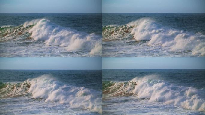 冒着泡沫的海浪膨胀着撞击着海面。大白水溅浅
