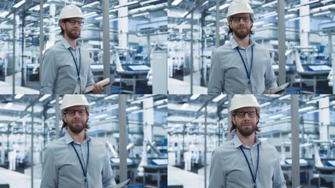 年轻的电子制造工程师微笑着看着相机。一个戴着白色安全帽的男人的肖像。监控工厂人工智能系统的专家