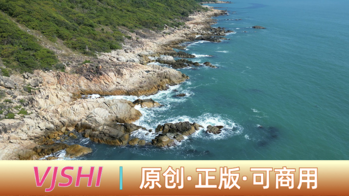 4K三亚海水海滩浪花拍打在礁石上