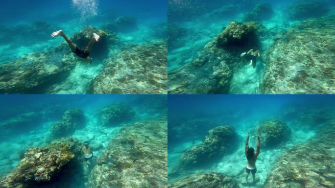 男子在蓝色的海底浮潜游泳。和一个人在海水里自由潜水。在深海中浮潜和潜水。浅水中的海洋生物。在珊瑚礁附