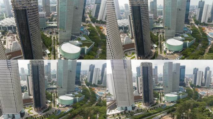 白天新加坡市中心商业综合体交通广场喷泉航拍全景4k延时拍摄