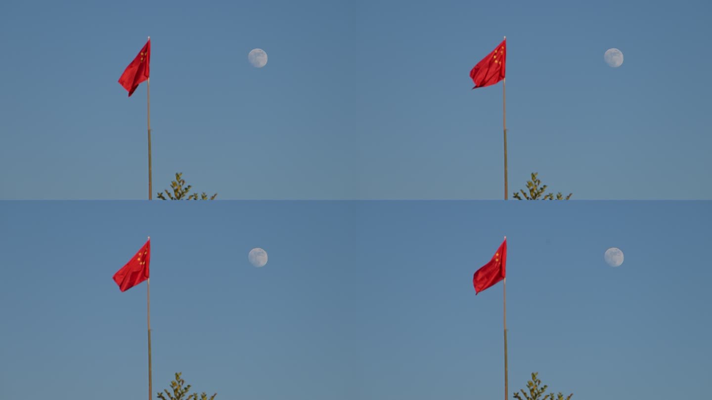 月亮旁的国旗在风中摇曳