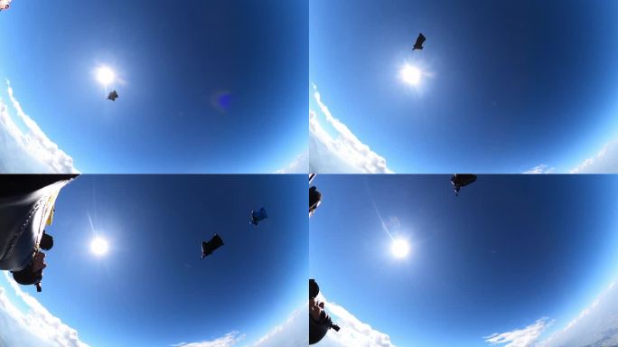 翼装飞行员在瑞士山区上空翱翔