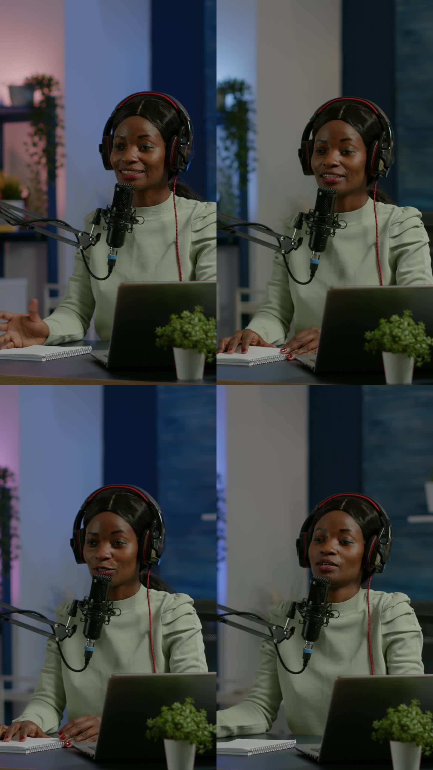 垂直视频:非洲社交媒体女性看着笔记本电脑对着麦克风说话
