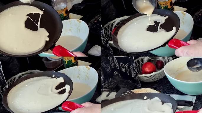 一个女人把煎饼面糊倒进煎锅里。煎饼是在平底锅里煎的。烘焙自制俄罗斯煎饼的过程。炊烟从煎饼中升起。