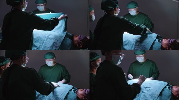 一个装有各种手术工具和医疗用品的医疗托盘的特写，一名护士在手术室手术前用绿布盖住躺在手术床上的昏迷病