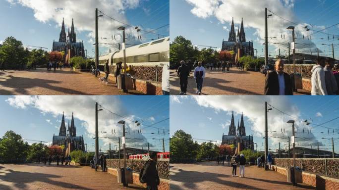 德国科隆库尔特·罗萨广场，游客们手持爱情挂锁漫步游览科隆大教堂和科隆中央车站