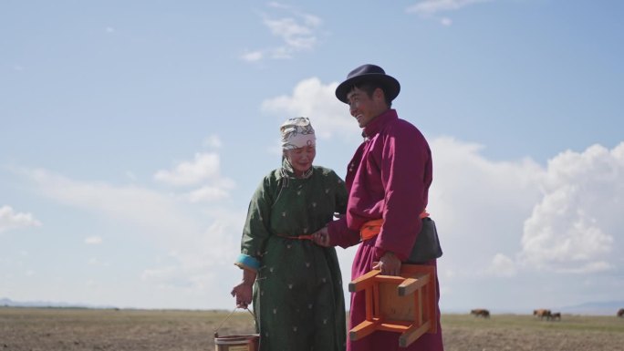 蒙古游牧夫妇在户外牧场