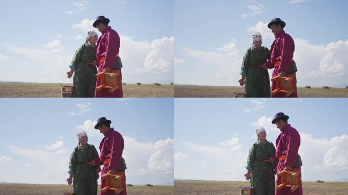 蒙古游牧夫妇在户外牧场