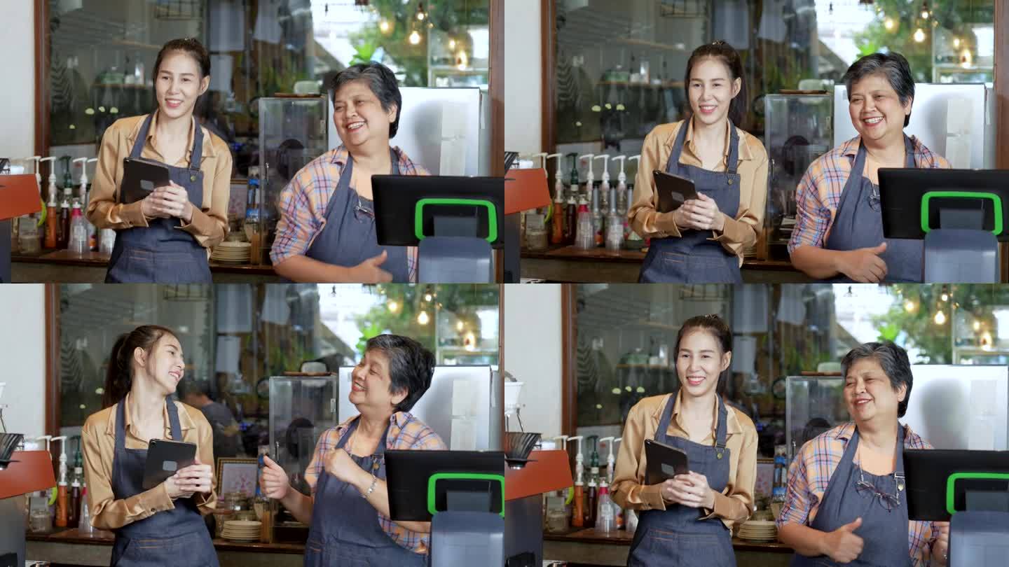 小创业的业主概念。两个成功的女咖啡师，家人开心地跳舞，微笑着，带着正能量在早上开店。