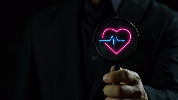 放大镜聚焦发光的霓虹线红色心脏与蓝色脉冲线图标。心脏搏动，心跳孤独，健康生活方式，医疗保健，爱，正念