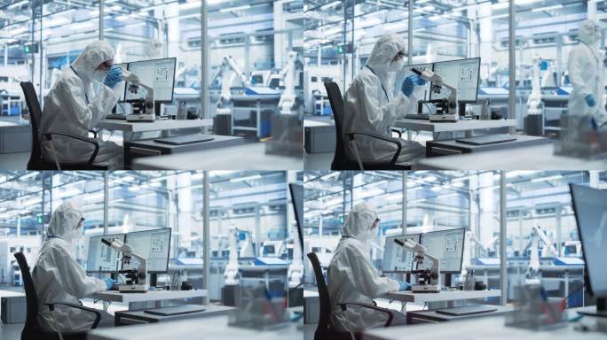 现代工厂:工业工程师穿着干净的无菌工作服在台式电脑前工作。科学家使用显微镜，为高科技医学疫苗和基因研