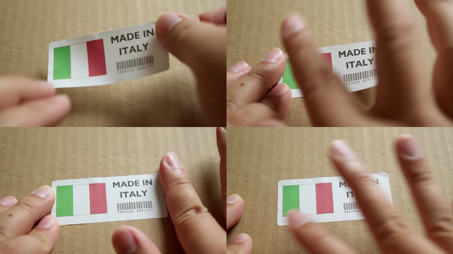 手应用制造在意大利国旗标签上的运输箱与产品优质条码。制造和交付。产品出厂进出口。