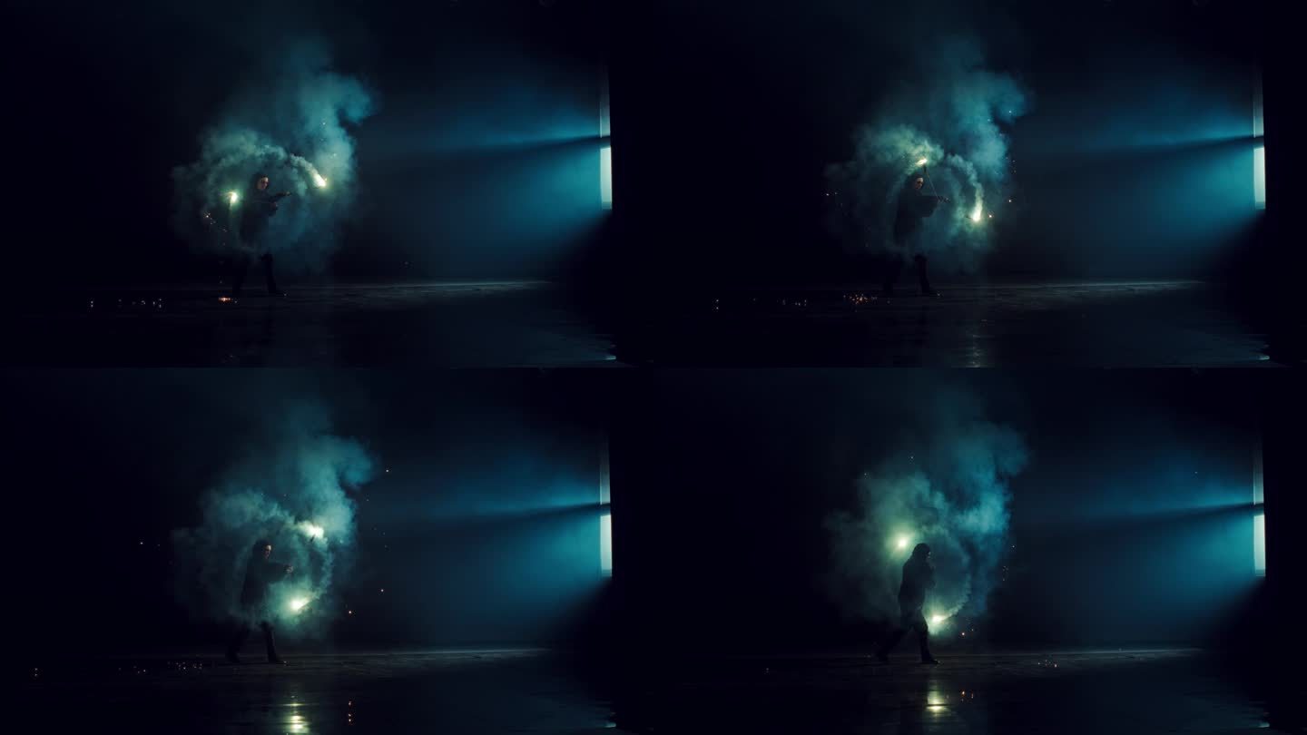 娱乐火艺术家在节日的黑暗舞台上旋转火锅饼。具有烟雾和实用火焰效果的创意艺术表演。穆迪电影超级慢动作与