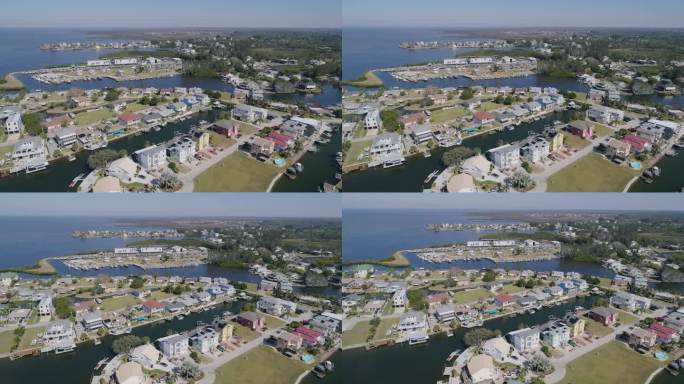 4K无人机视频(Pan Shot)的海滩公园，码头和海滨住宅在哈德逊海滩在墨西哥湾在佛罗里达州