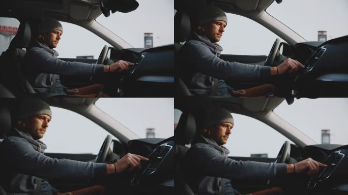 男子用触摸屏在汽车上编程GPS