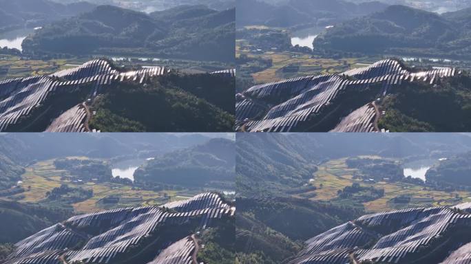 山顶上葱郁的树林和太阳能发电厂的航拍照片