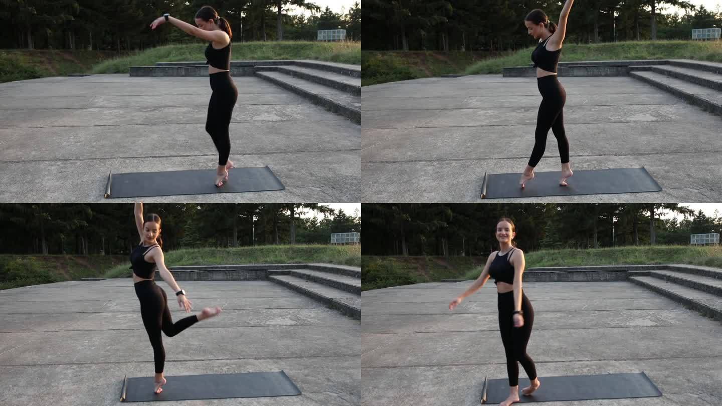 年轻的芭蕾舞演员在公园里做热身运动。她在运动垫上踮着脚尖走路