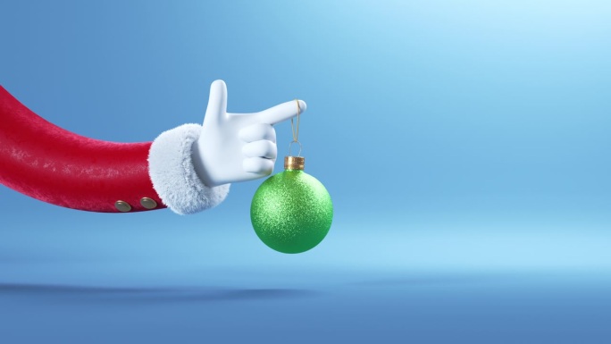 3d动画，滑稽的卡通圣诞老人手从左边出现，手里拿着挂着的玻璃球装饰物。圣诞动画贺卡