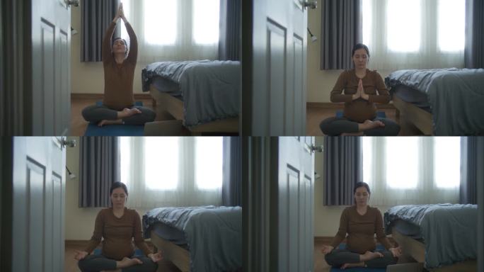 孕妇在家做瑜伽伸展运动，跟踪拍摄